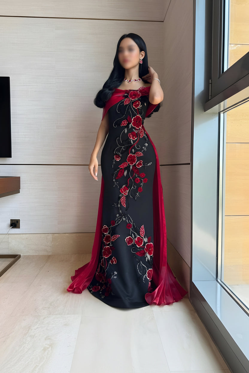 فستان تول أسود مطرّز بالورد الأحمر