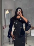 فستان أسود ناعم بالتطريز الفضي